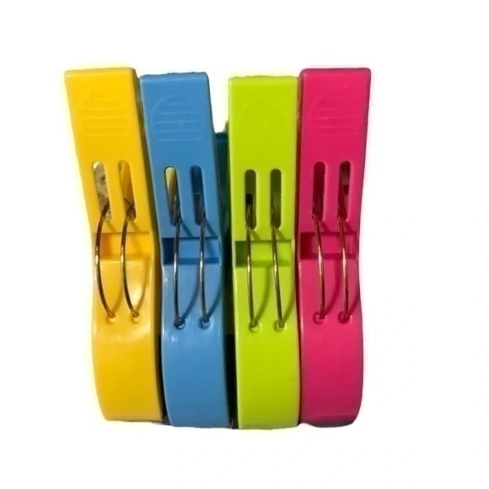 Four towel clips, clips on beach chairs